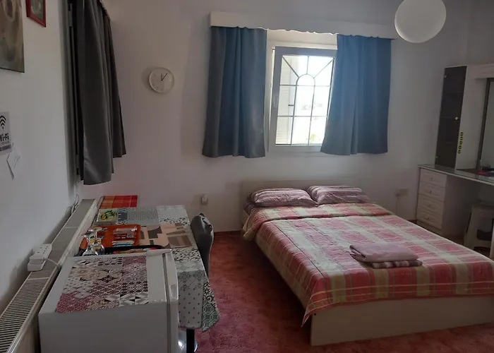 Δωμάτια σε οικογενειακή κατοικία Vasilis House Family